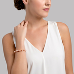 Armband aus 8,0–8,5 mm großen pfirsichfarbenen Süßwasserperlen – AAA-Qualität – Modellbild